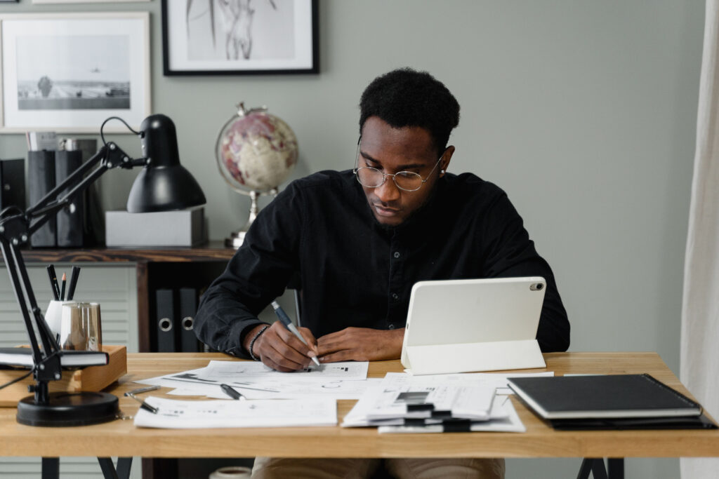 Business man at desk with papers