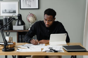 Business man at desk with papers